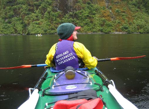 Robin sat in the front seat of our tandem kayak